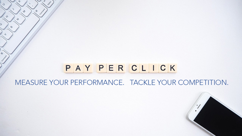 "pay per click" spelled out in letter tiles